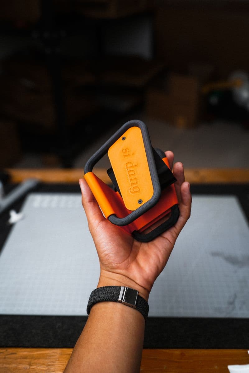Orange version of handheld fan dock